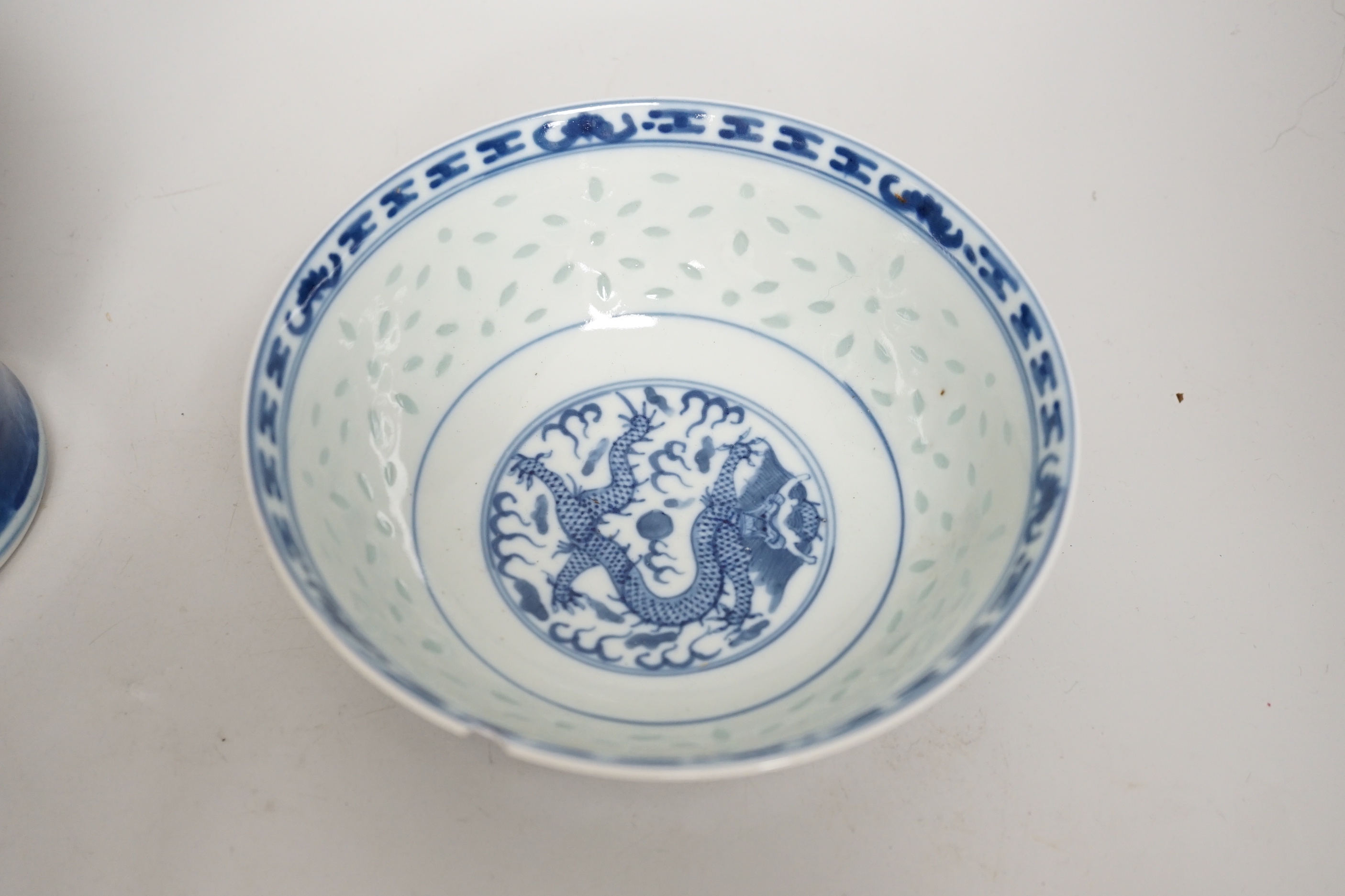 Chinese blue and white ceramics and a miniature famille rose vase, the largest 25cm high